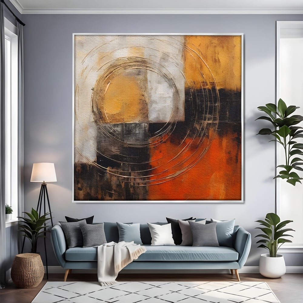 Tablou canvas cu pictura abstracta cu cercuri suprapuse, in rama de aluminiu argintiu, pe perete intr-un living